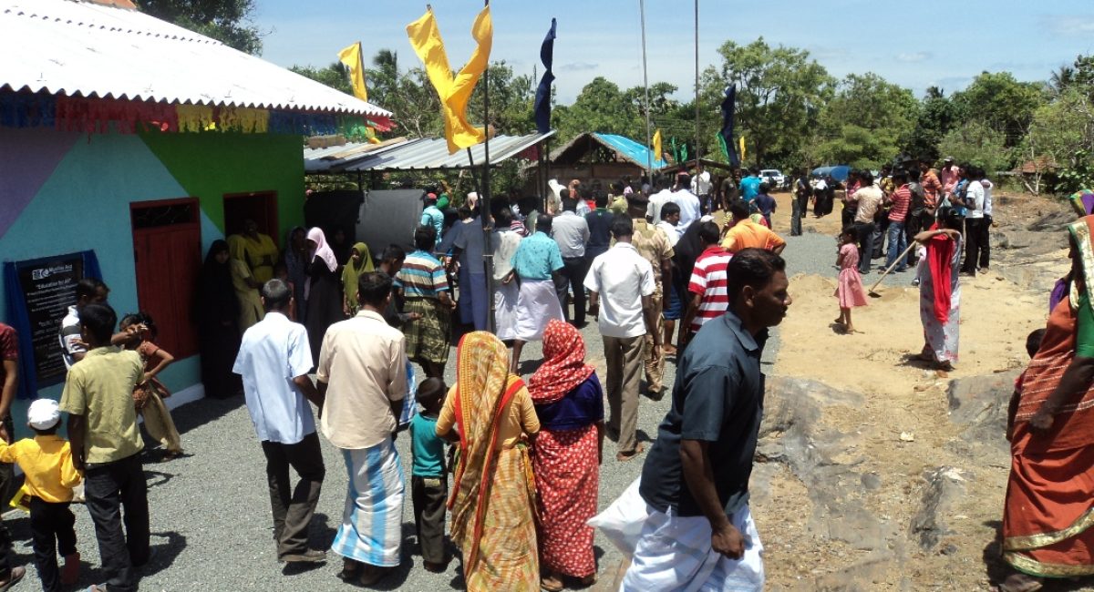 crowds_gathering_for_opening_ceremony_of_new_school